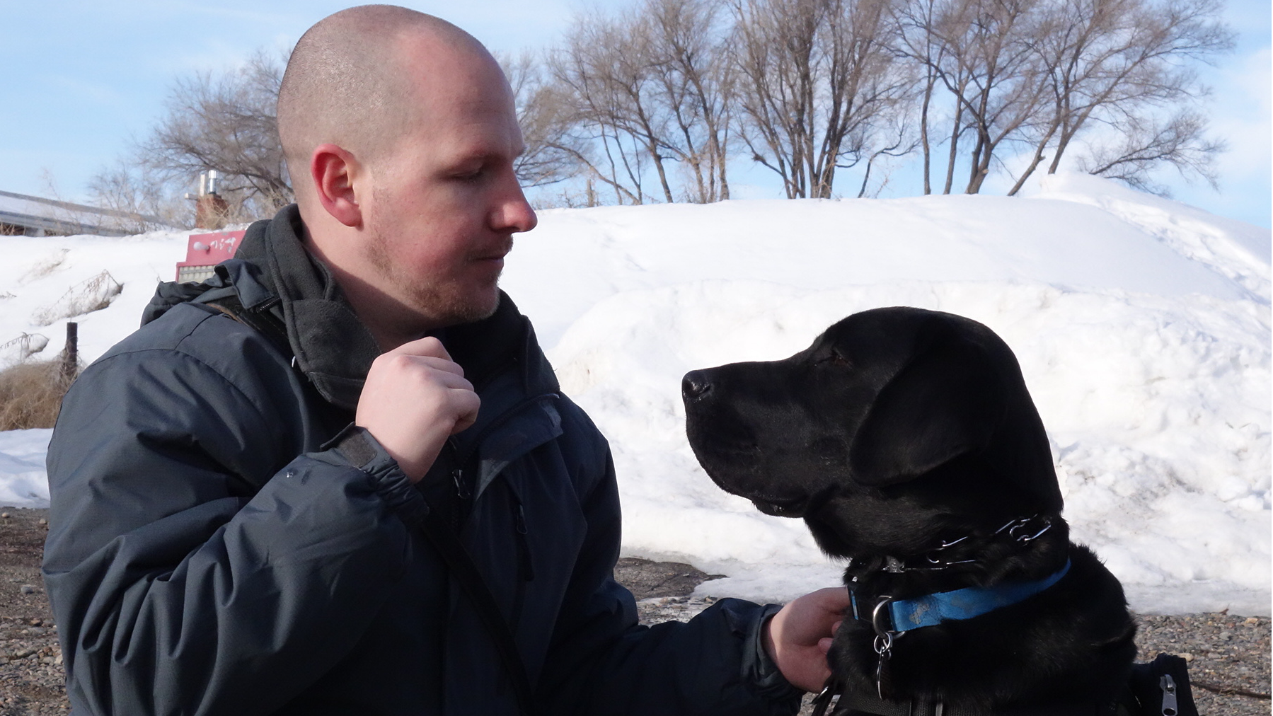 Tom Flood with his service dog, Mako, in “To Be of Service”. Photo Credit: Josh
Aronson.